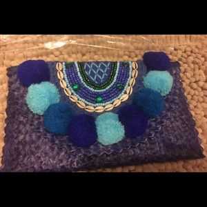 Beaded Straw Clutch with Pom-Poms